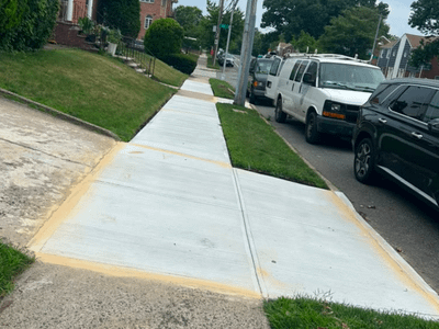 Corner Lot Sidewalk and Driveway Apron Repair in Queens